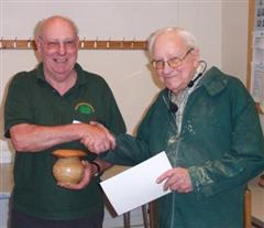 Pat Hughes receives his certificate from Bill Jones